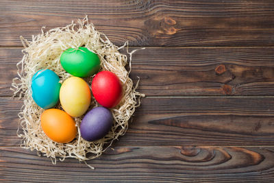 High angle view of easter eggs on hay