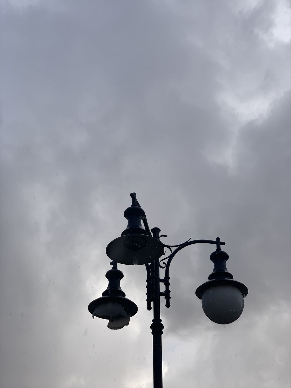 STREET LIGHT AGAINST SKY