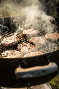 Close-up of meat on barbecue grill
