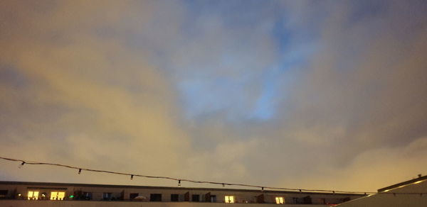 Low angle view of bridge against sky at sunset