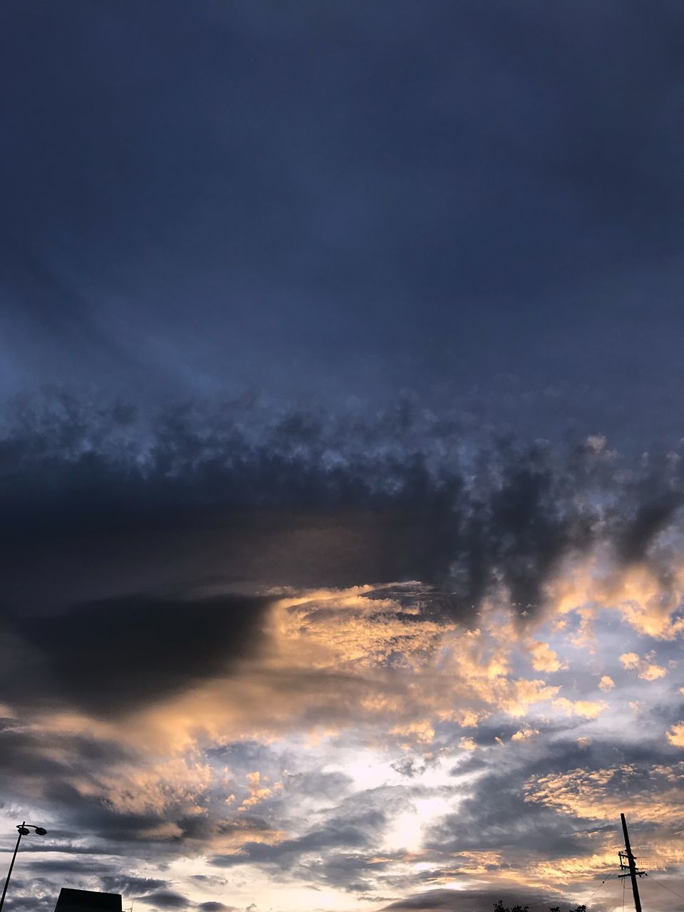 LOW ANGLE VIEW OF CLOUDSCAPE DURING SUNSET