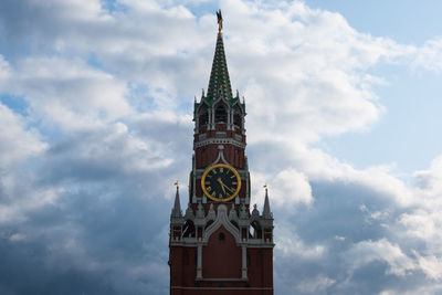 Low angle view of clock tower against sky