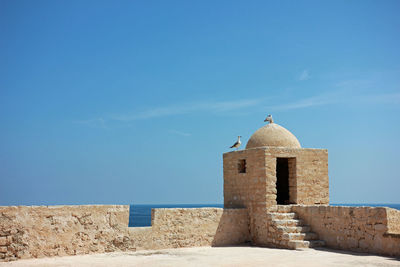 Historic building against blue sky