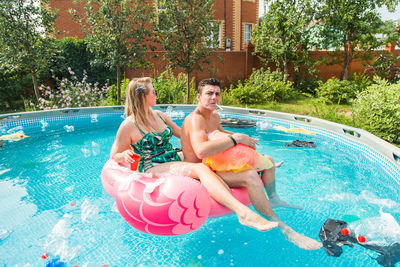 High angle view of people in swimming pool