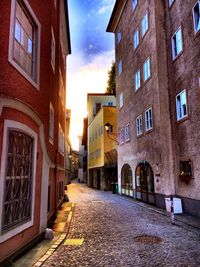 Houses in city against sky