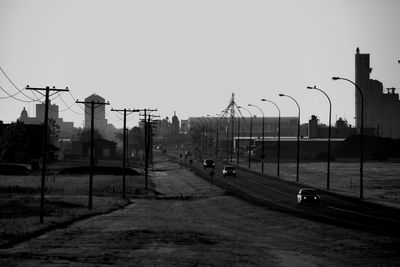 Street lights against clear sky