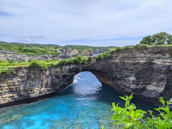 Scenic view of rock formation against sky