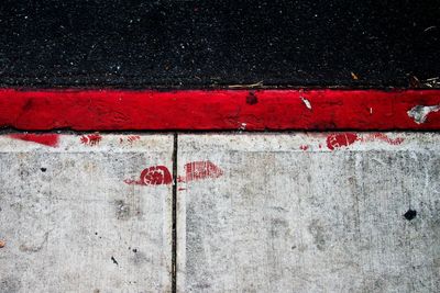 High angle view of sidewalk by road