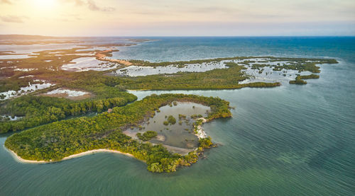 Beautiful sunset in the bay of tucacas, falcon - venezuela. aerial view.