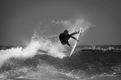 Man surfing in sea