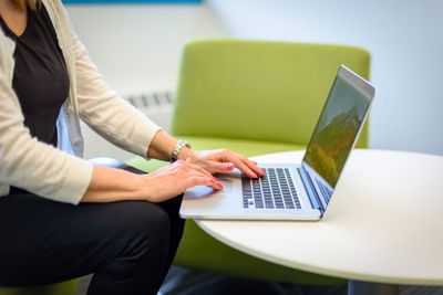 Man using laptop on table