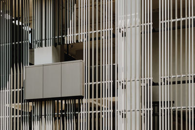 Abstract view of a vertical metal strips on a building exterior