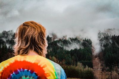 Woman looking at view of trees