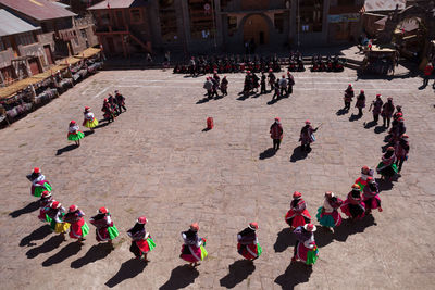 High angle view of people at town square