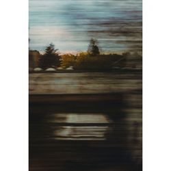 Defocused image of road against sky