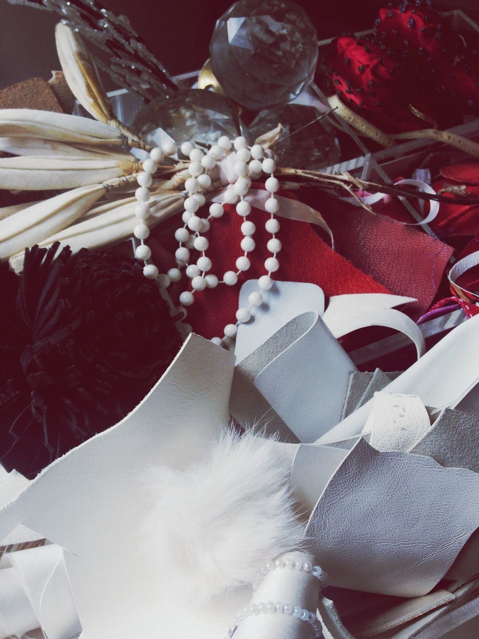 indoors, still life, close-up, freshness, large group of objects, food and drink, hanging, variation, abundance, food, no people, table, white color, fruit, high angle view, group of objects, red, choice, decoration, healthy eating