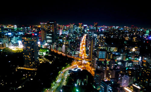 Illuminated cityscape at night