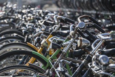 Close-up of bicycles in parking lot