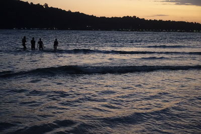 Scenic view of sea at sunset