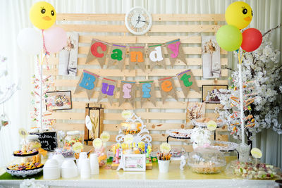 Close-up of clock hanging on clothesline