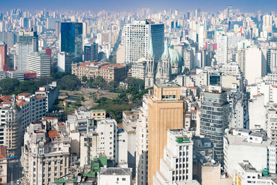 High angle view of modern buildings in city