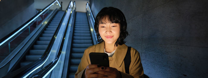 Young woman using mobile phone