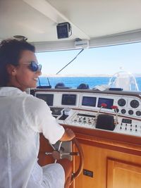 Side view of a woman in boat