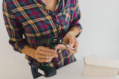 Midsection of woman working