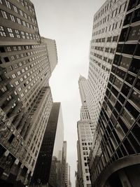 Low angle view of skyscrapers against sky