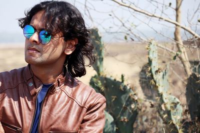 Portrait of young man looking away