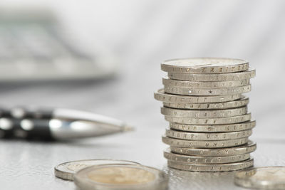 Close-up of coins on table