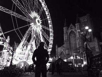 Rear view of people at amusement park