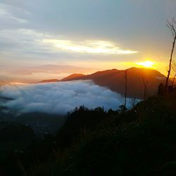 Scenic view of landscape against sky during sunset