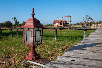 Built structure on field against clear sky