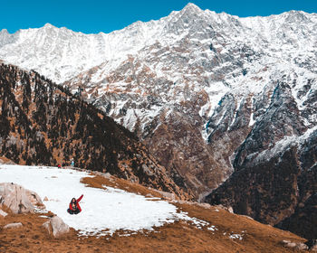 Scenic view of snowcapped mountains during winter