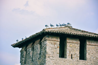 Low angle view of old building against sky