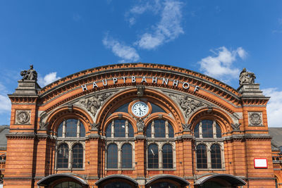 Low angle view of historical building against blue sky