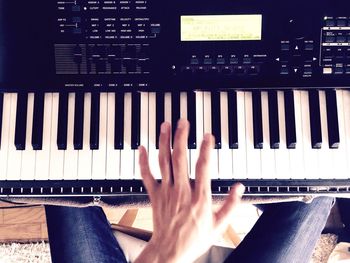 Close-up of human hand on wall