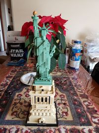 Close-up of statue on table at home