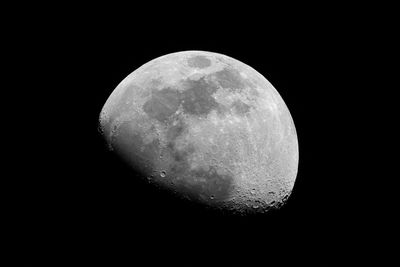 Low angle view of moon against sky at night