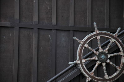 Close-up of clock on wood