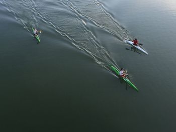 High angle view of people on kayak in sea