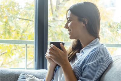 Young woman using mobile phone