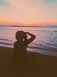 Scenic view of sea at sunset