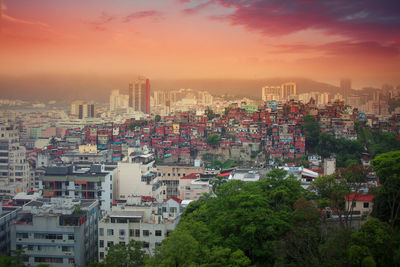 High angle view of townscape against sky during sunset