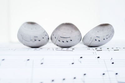 Spoons on music notes