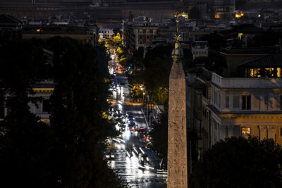 High angle view of city buildings at night