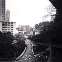 Road in city against sky