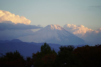 View of volcanic mountain against cloudy sky