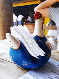 Close-up of tissue papers on table in restaurant